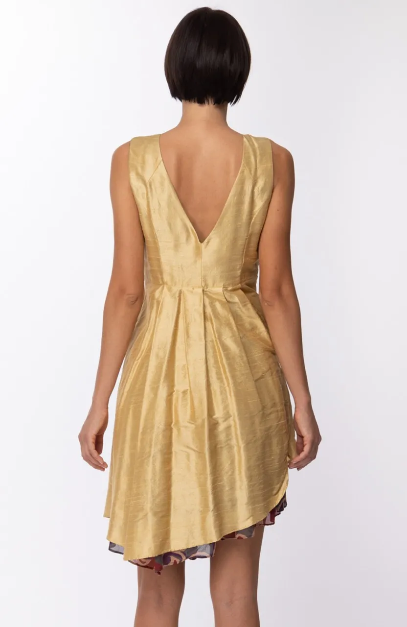 Abito smanicato con gonna asimmetrica Oro