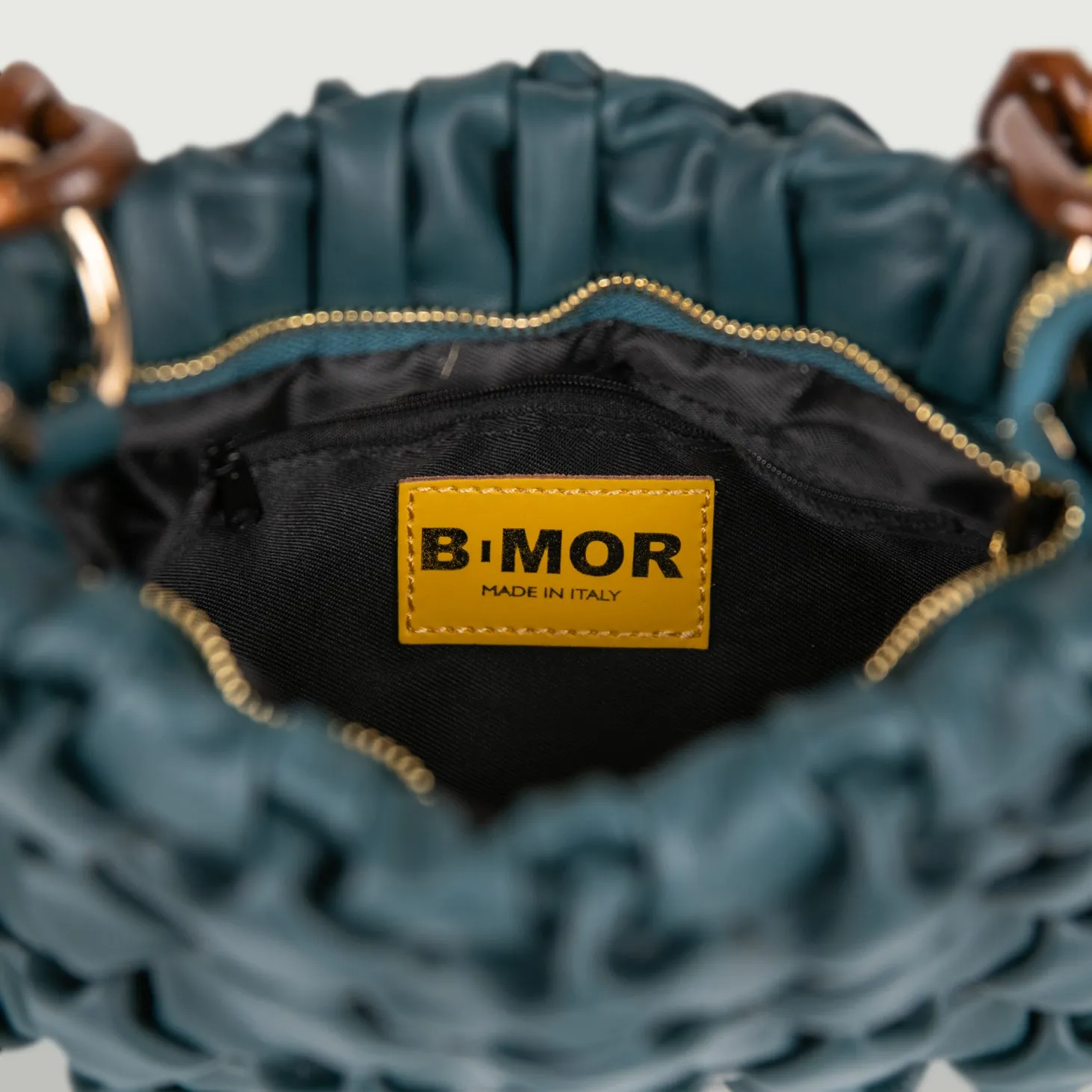 BORSA IN PELLE INTRECCIATA OTTANIO CURLY