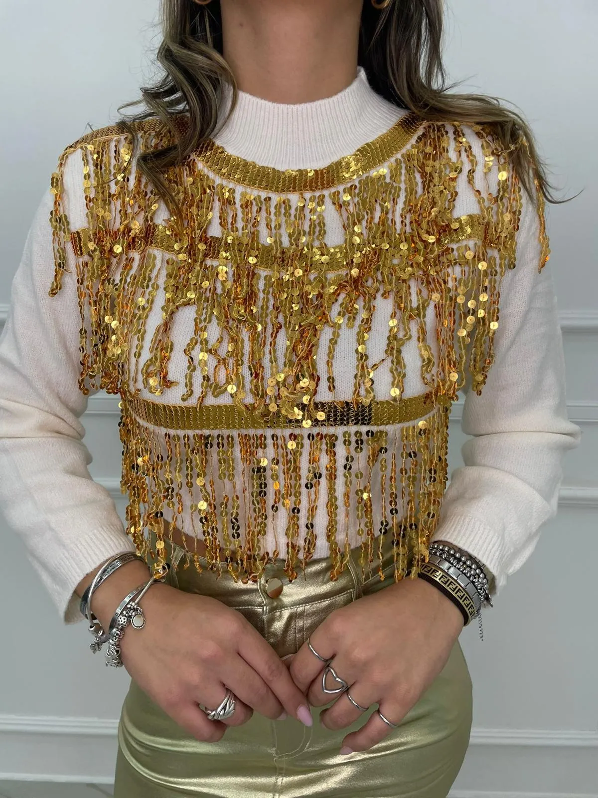 Maglione mezzo collo con cascata di paillettes