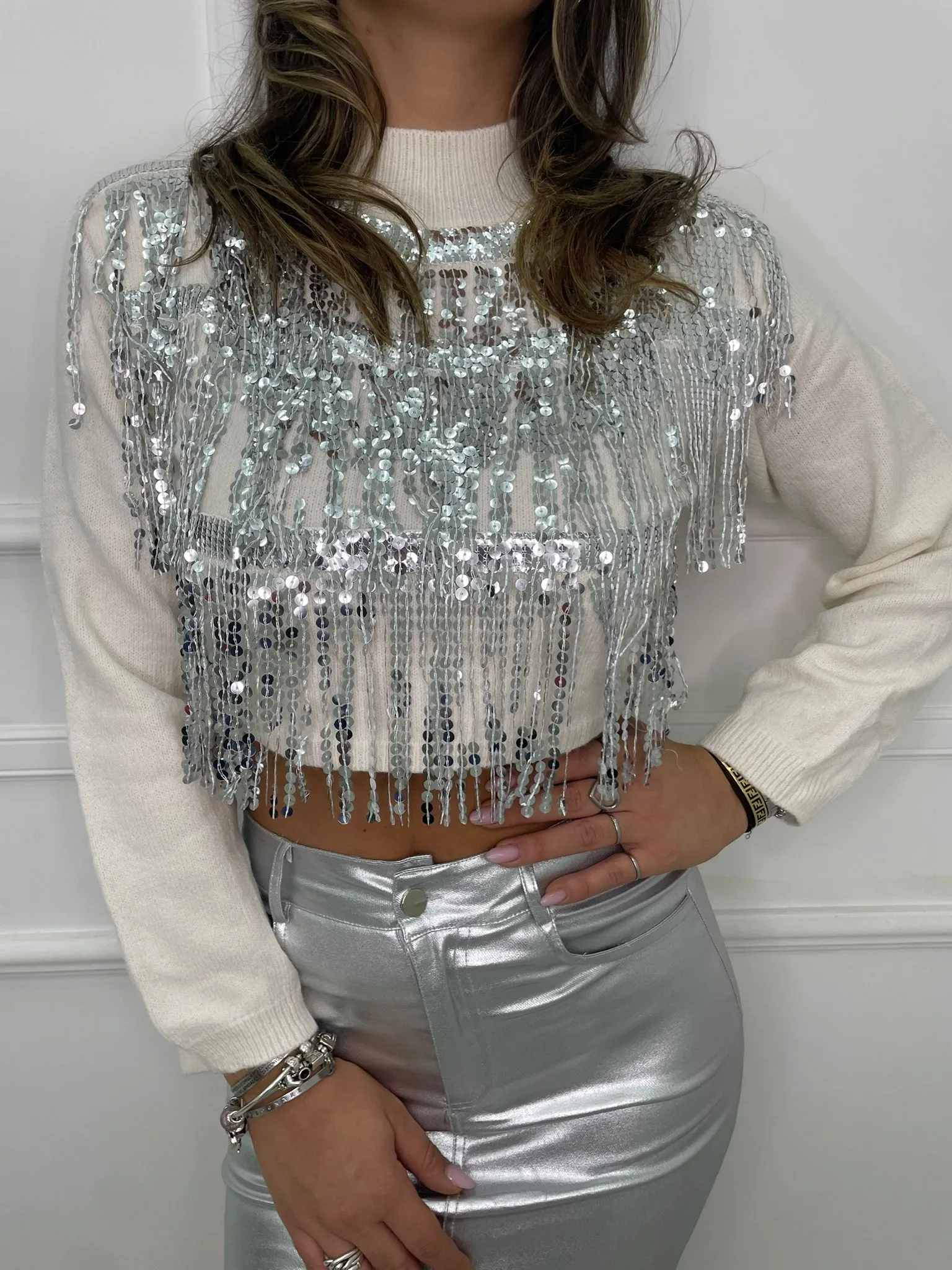 Maglione mezzo collo con cascata di paillettes