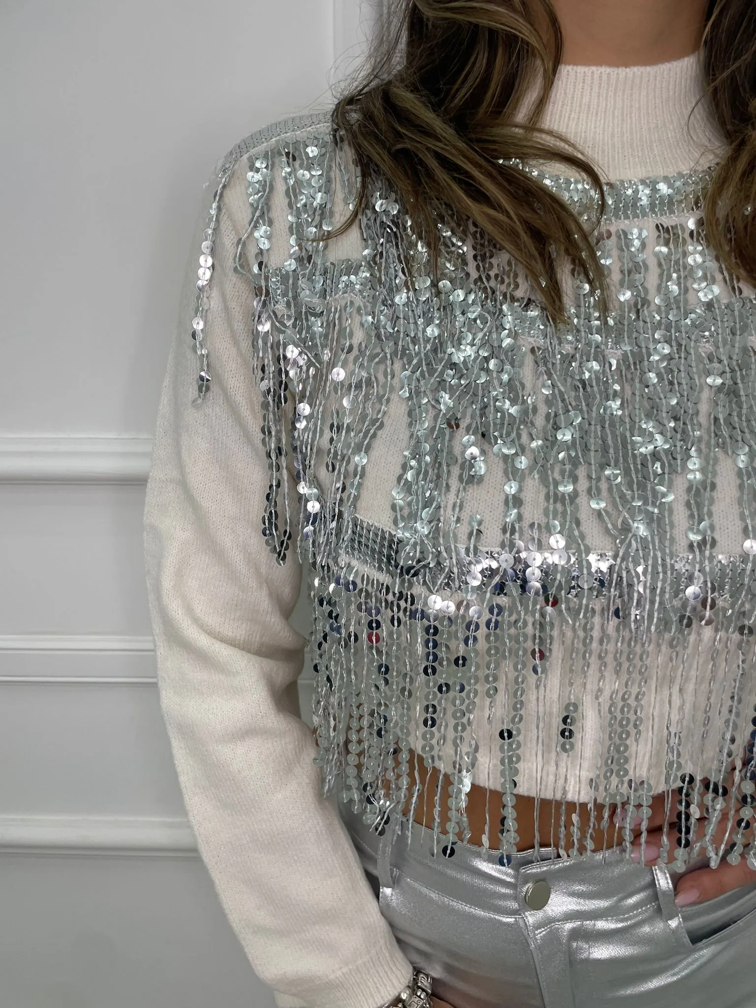 Maglione mezzo collo con cascata di paillettes