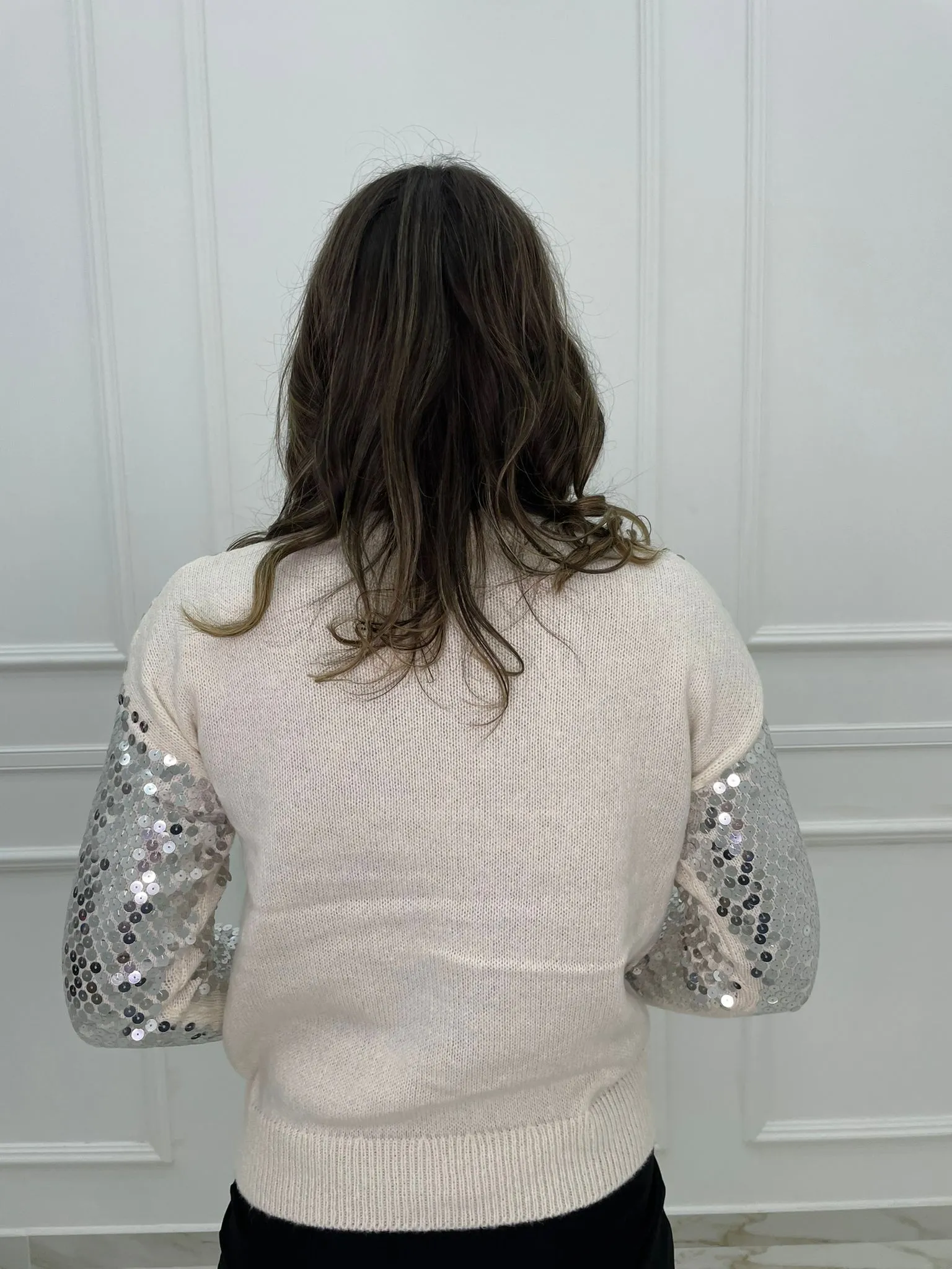 Maglione tinta unita con paillettes