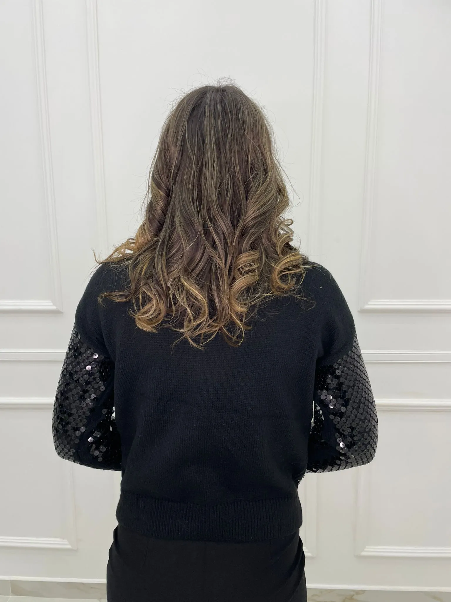 Maglione tinta unita con paillettes