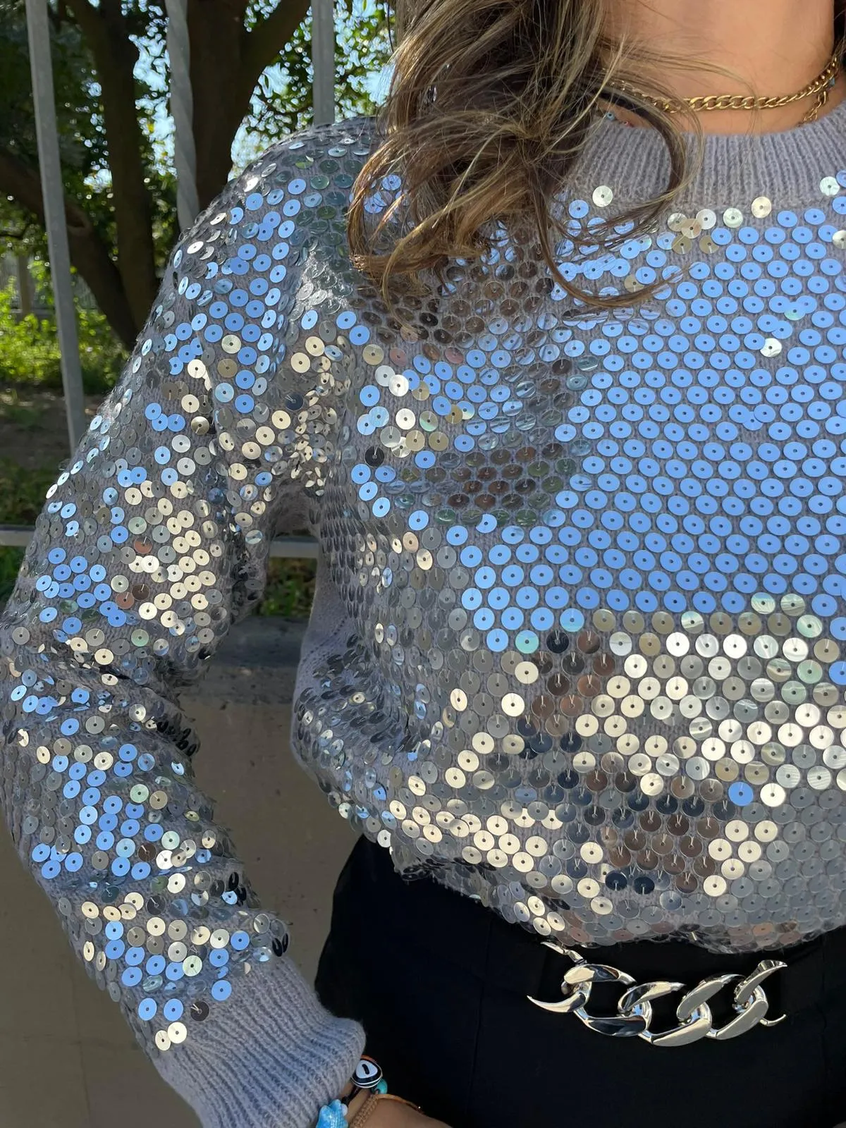 Maglione tinta unita con paillettes
