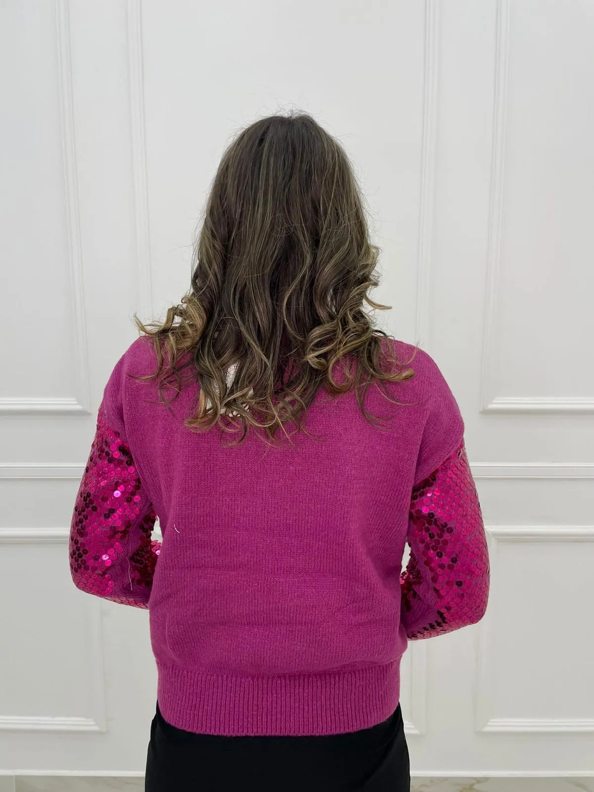 Maglione tinta unita con paillettes