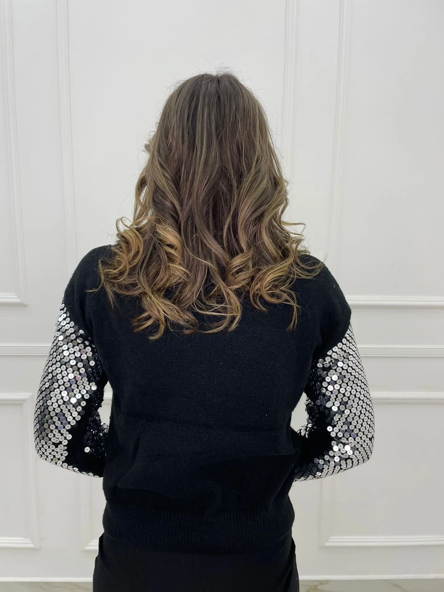 Maglione tinta unita con paillettes