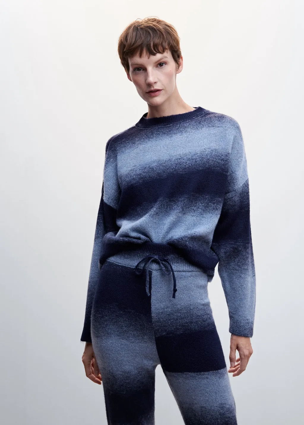 Pullover coste collo stondato