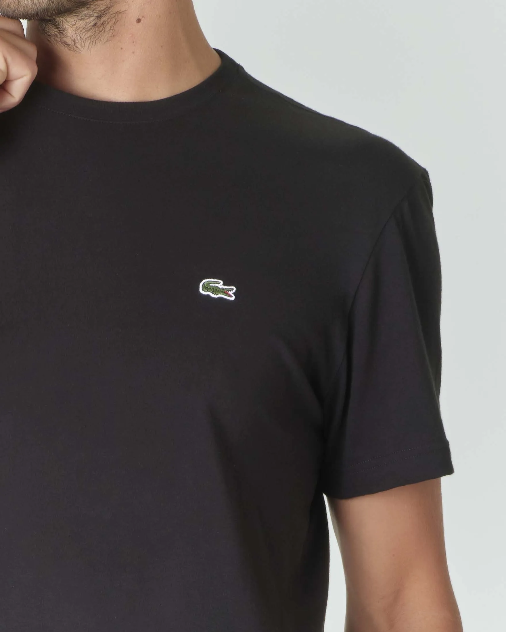 T-shirt nera in puro cotone con logo coccodrillo verde